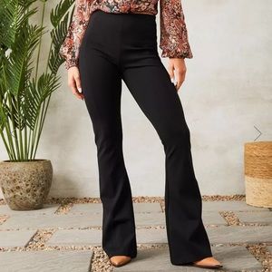 Black Shinestar Pants. Size small